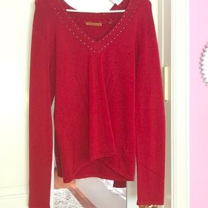 Red top with open V-neck collar